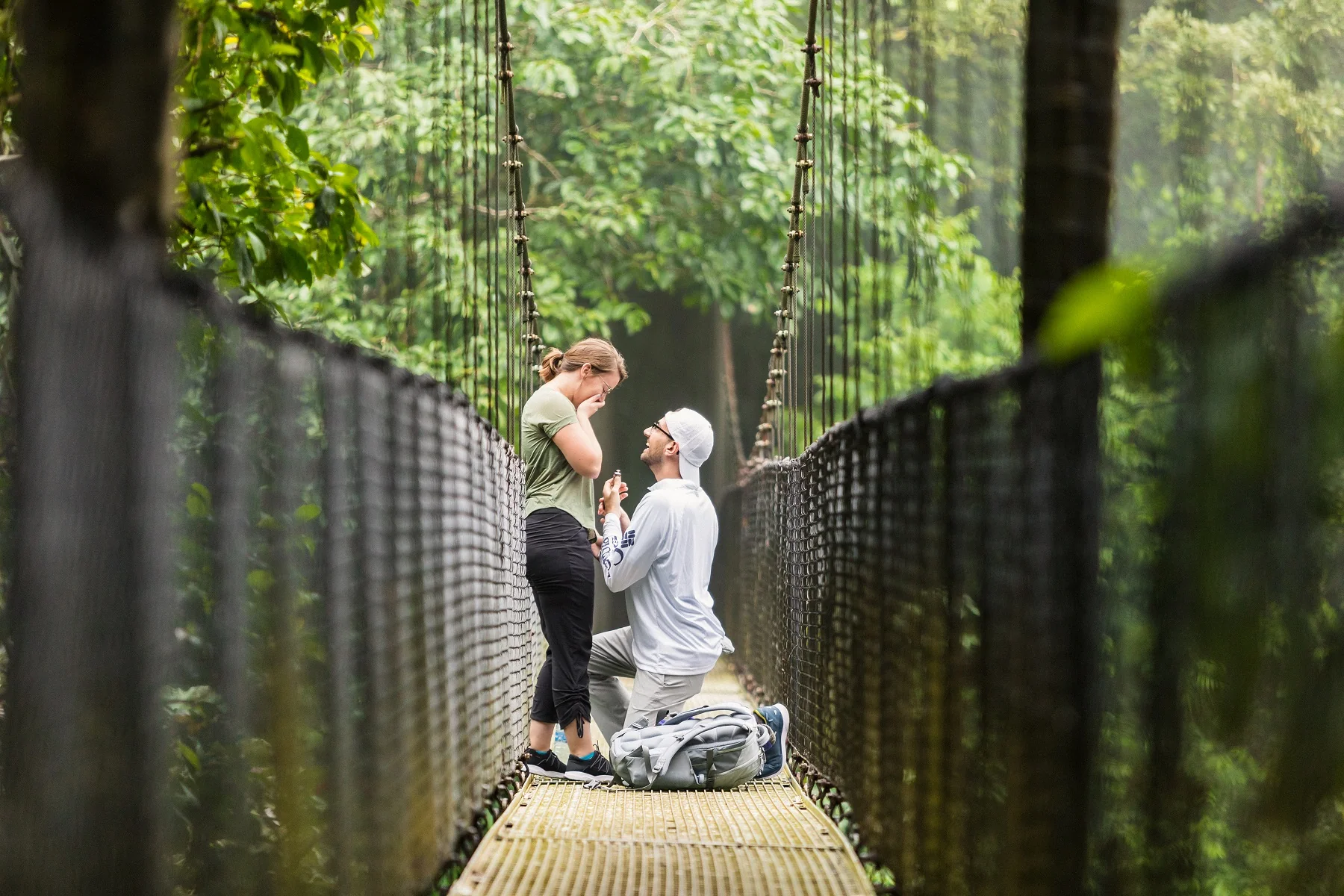 Nick & Kait surprise rainforest engagement proposal planning Costa Rica La Fortuna, Arenal hanging bridges
